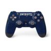 Skinit Calcomanía con efecto gastado y diseño de la NFL para el control de la consola Sony PlayStation 4 / PS4 DualShock 4